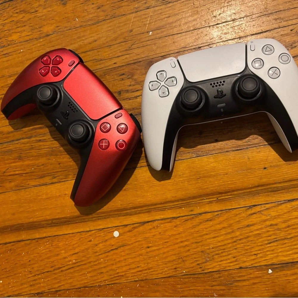 Sony Console with White and Red Controllers